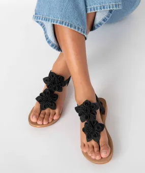 Sandales femme à entre-doigt ornées de fleurs en relief noir